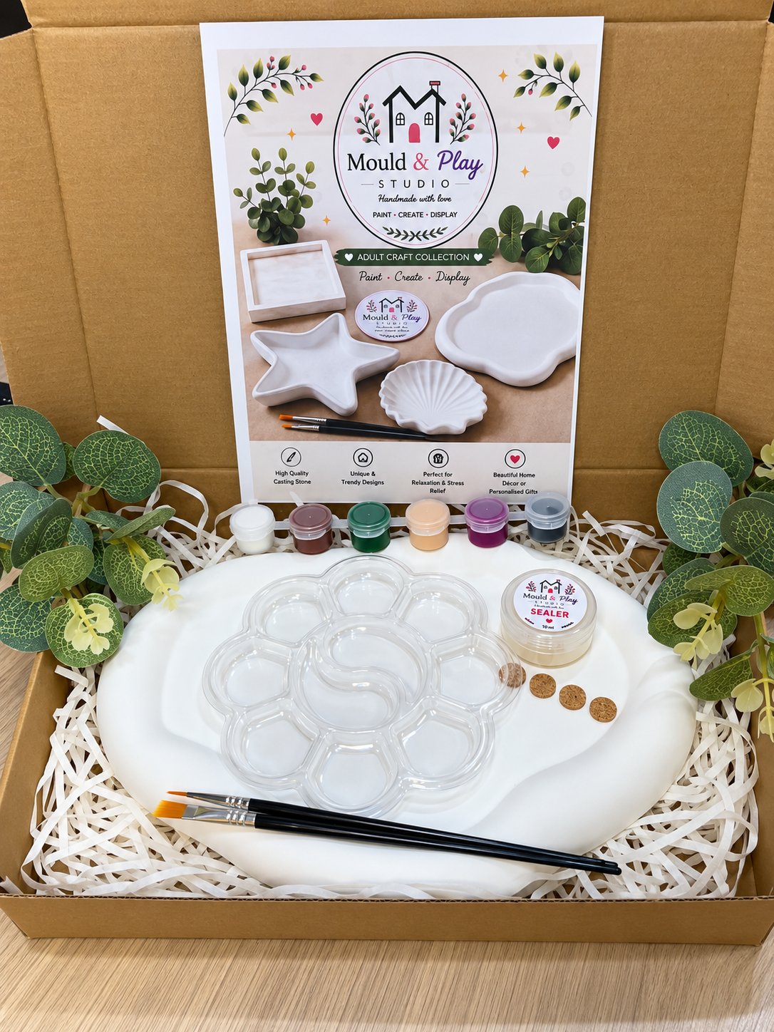 Adult paint box open, showing the plaster tray, paints, brushes, mixing tray and sealer